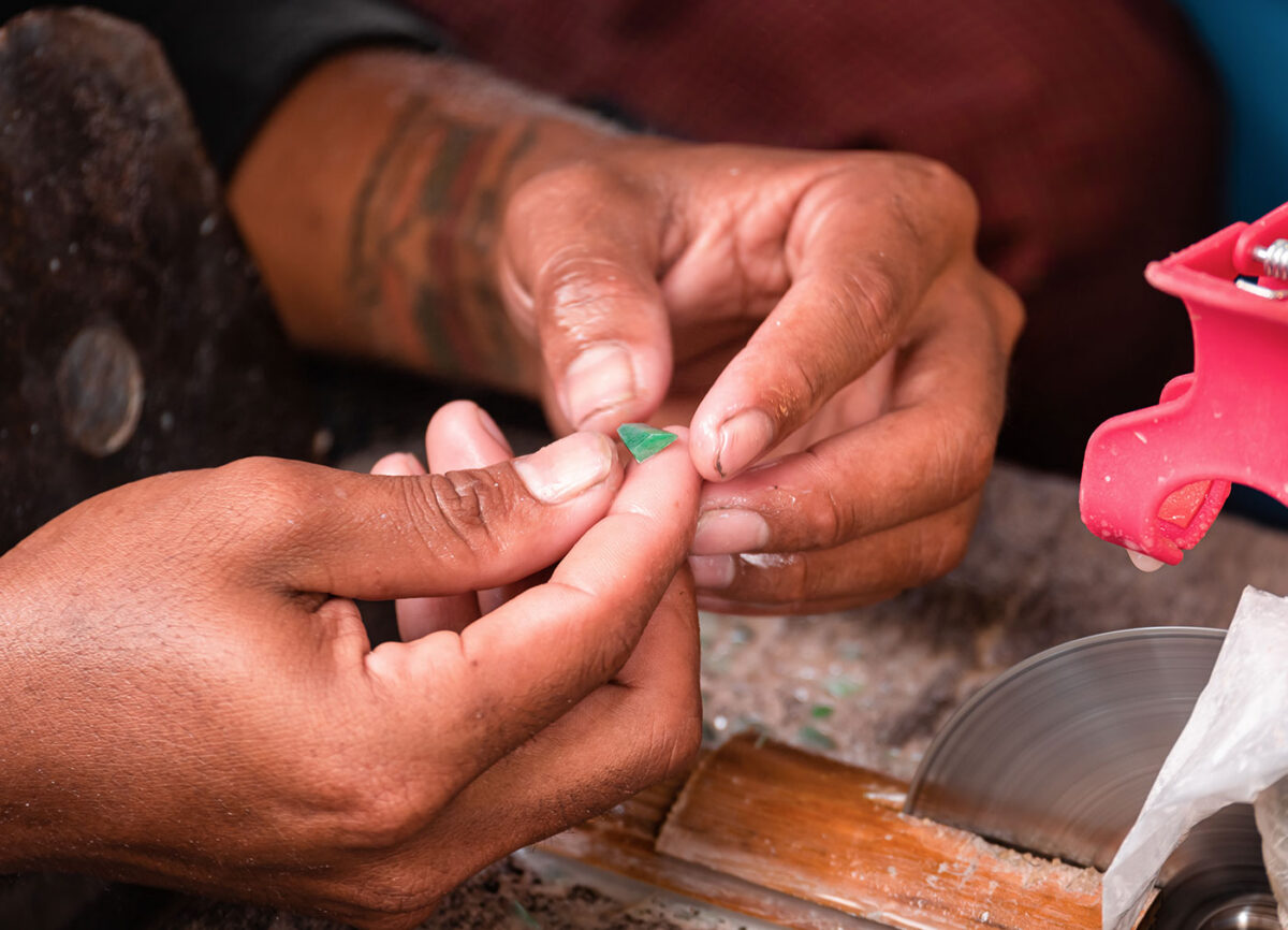 burmese people working on cutting stones 